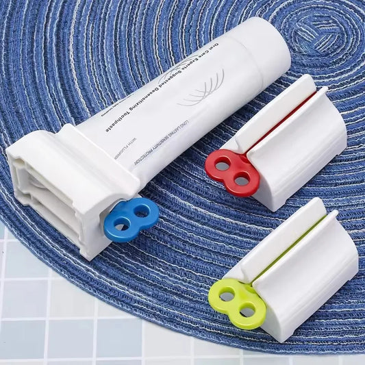1 Pc Rolling Tube Toothpaste Squeezer Toothpaste Seat Holder Stand Rotate Toothpaste Dispenser for Bathroom